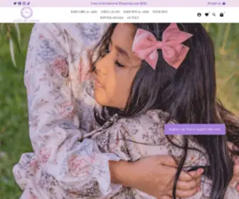 Lovebyginny.com(US based children luxury clothing store. The store) Screenshot